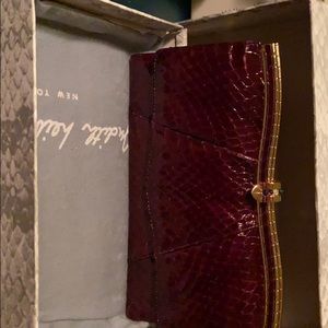 Judith Leiber snake skin wallet